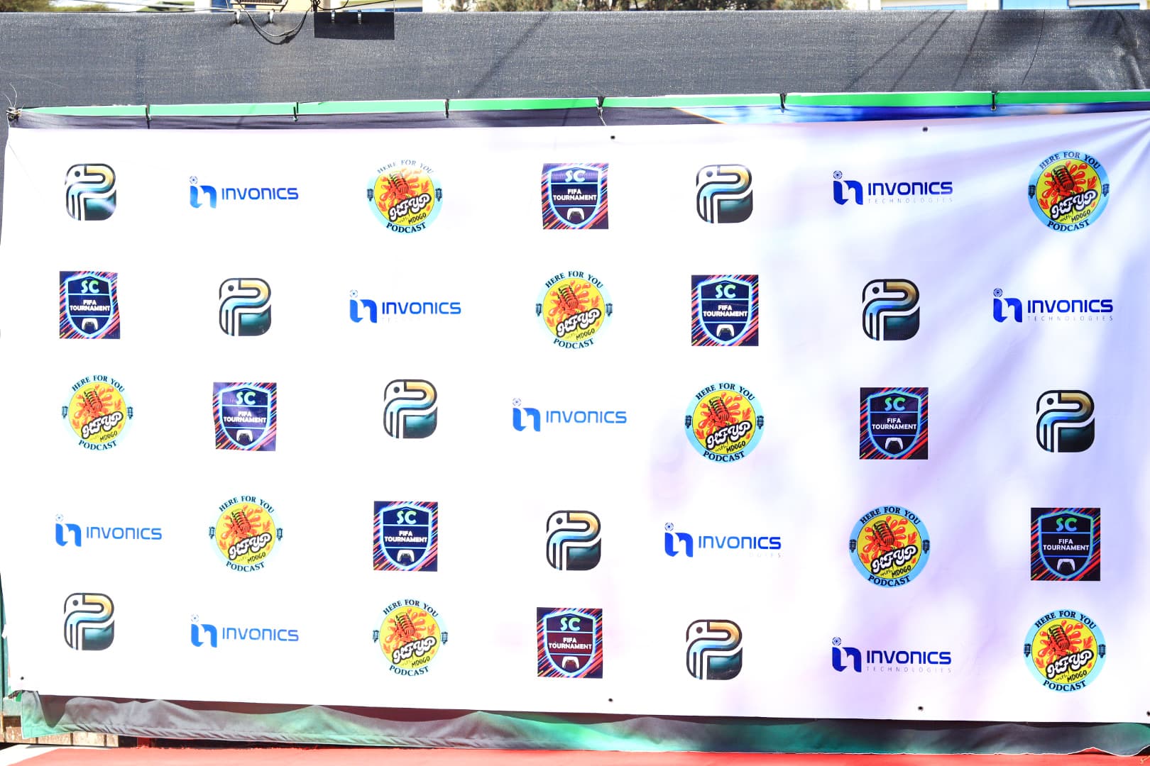 A branded event backdrop featuring Regal Films partner logos